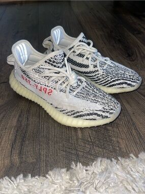Yeezy Zebra Knit Sneakers with Red Accent